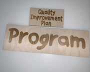 Quality Improvement Program(QIP) signs - Tiny Memories Laser